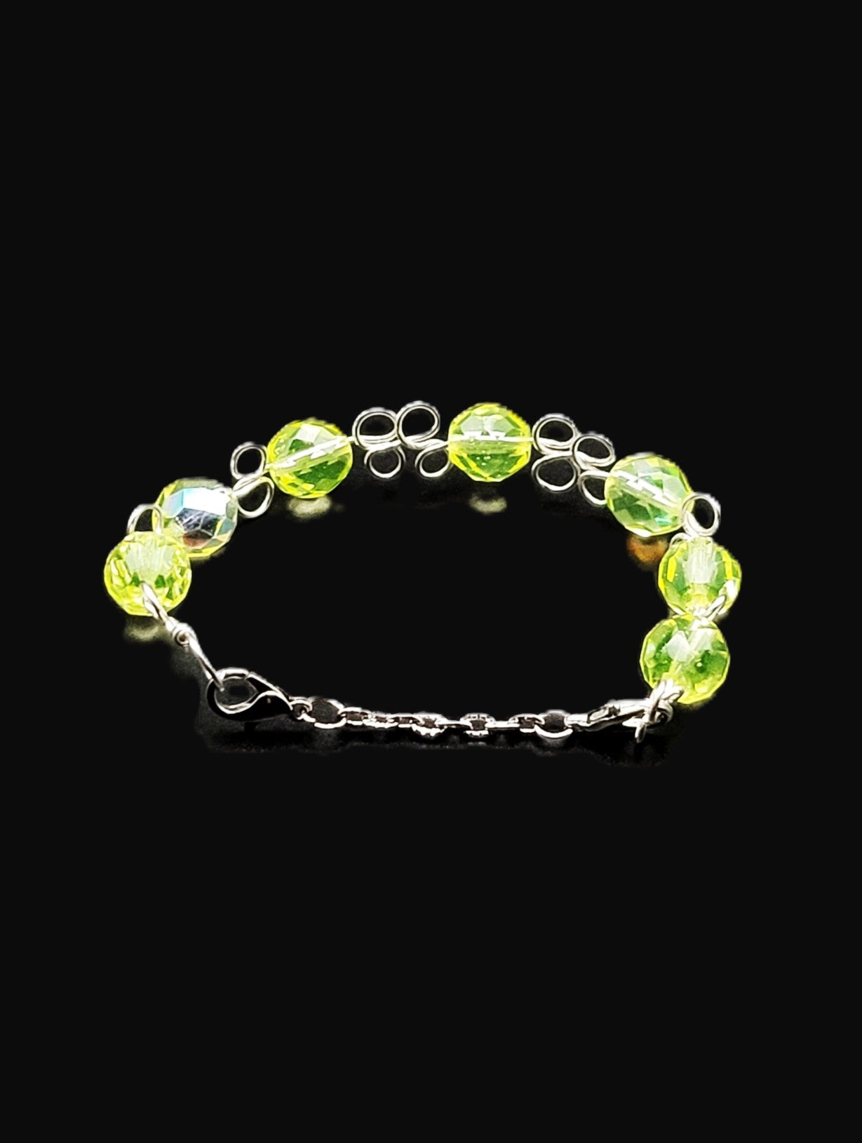 Uranium Czech green faceted glass bead on a Hand wired 6" dainty bangle bracelet with clasp