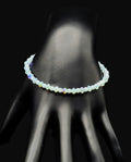 Light Blue Glow in the Dark Glass Bead Bracelet 7.5"
