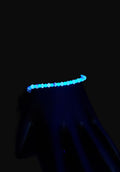Glow in the Dark blue glass beads and blue AB crystals strung on 7"cord with clasp bracelet