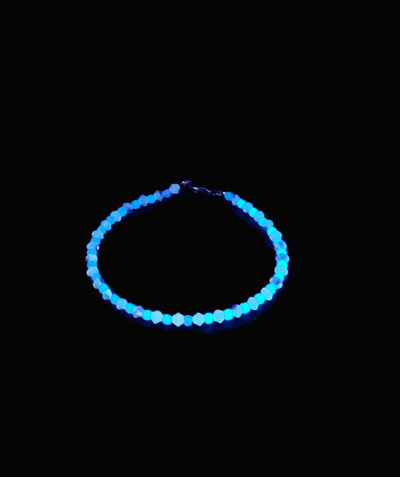 Light Blue Glow in the Dark Glass Bead Bracelet 7.5"
