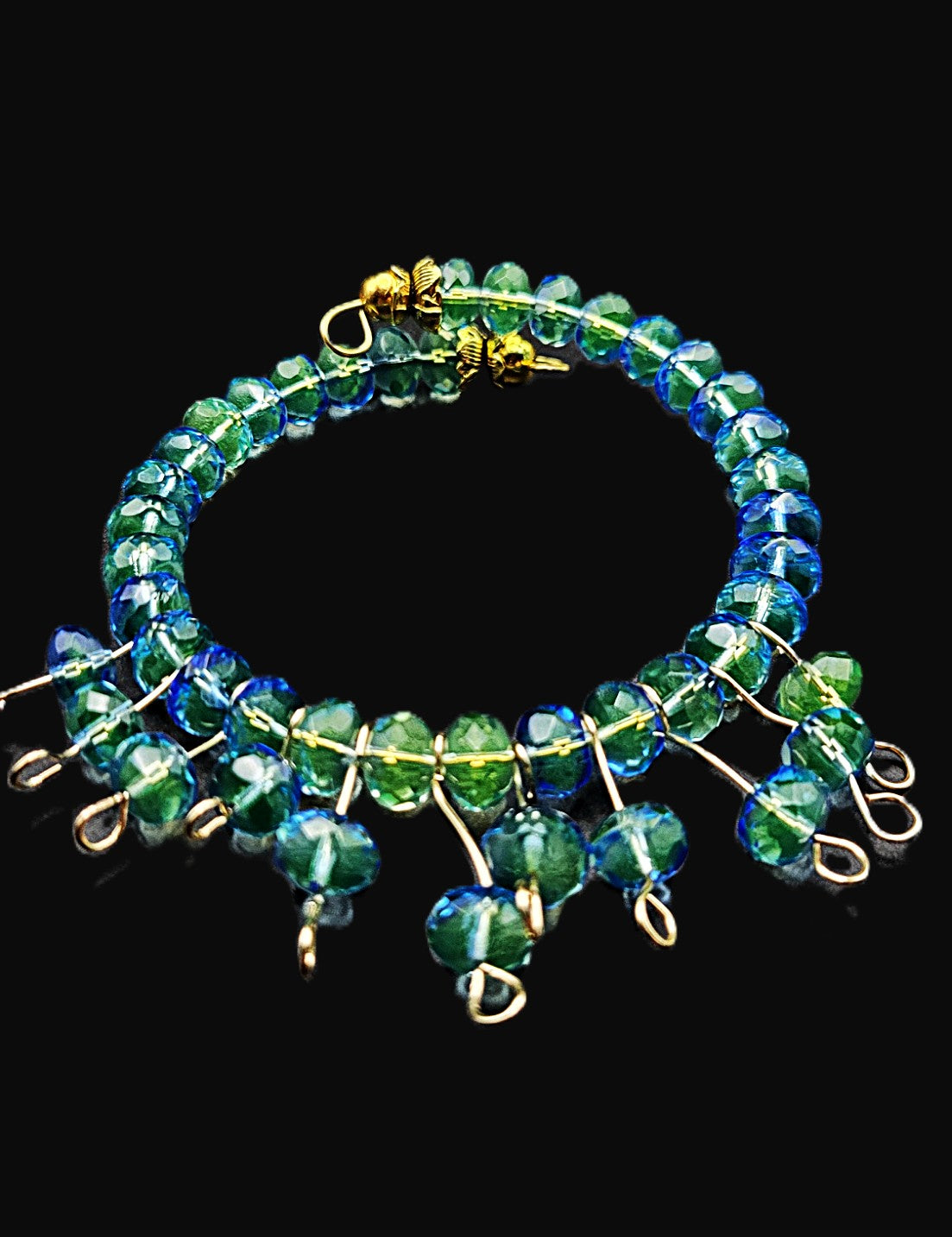 UV reactive uranium glass blue rondelle Czech beads coil bracelet with hand wired dangles bracelet 7.5"