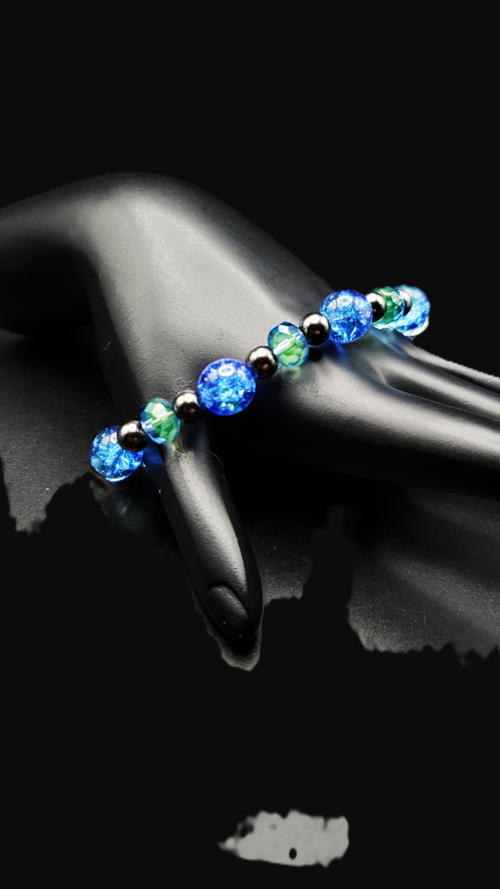 UV Reactive Stretch Bracelet – Czech Uranium Blue Crackle Glass, Gunmetal Spacers, 8"