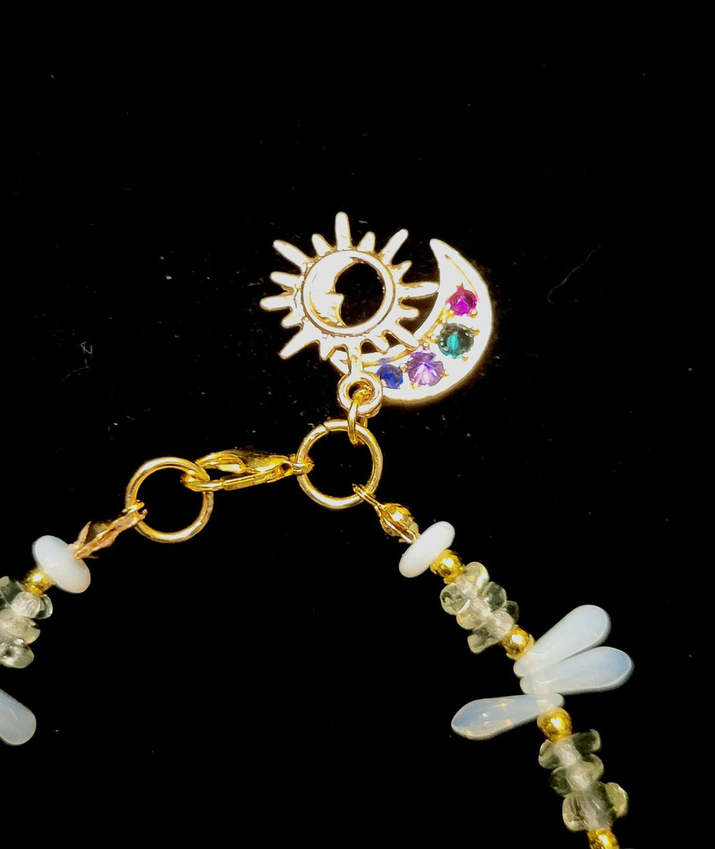 Uranium UV Glow 8" Stretch Bracelet With White and Green Glass Beads, Sun & Moon Charms