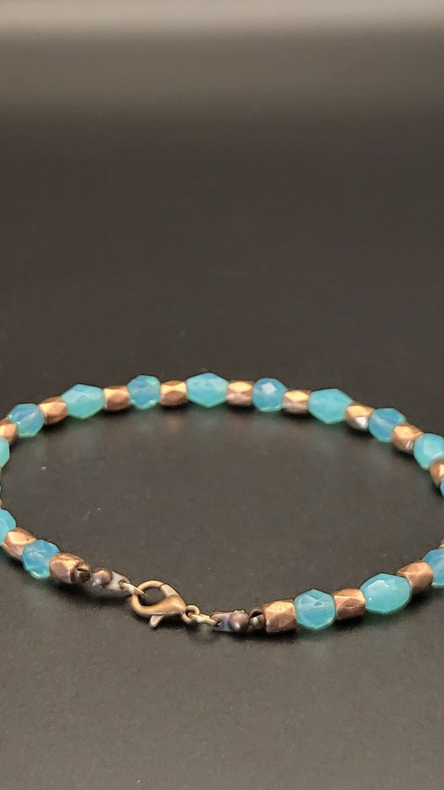 UV Glow Uranium Aqua Glass Beads and Copper Spacers 9"Stretch Bracelet