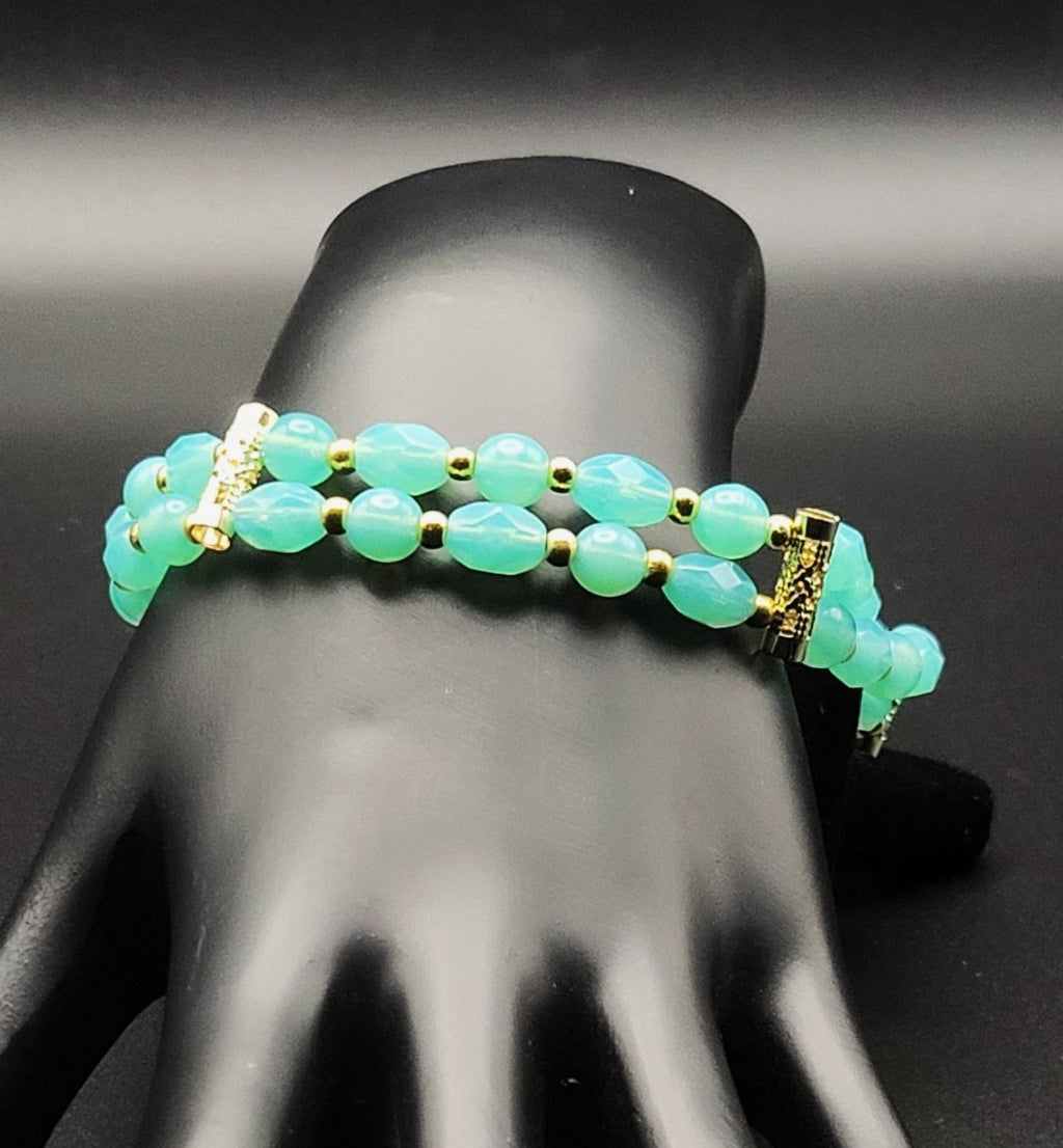 Uranium Glass UV Glow Aqua bead & Gold Accents 9" Stretch bracelet with Clasp