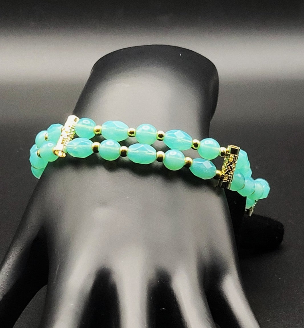 Uranium Glass UV Glow Aqua bead & Gold Accents 9" Stretch bracelet with Clasp