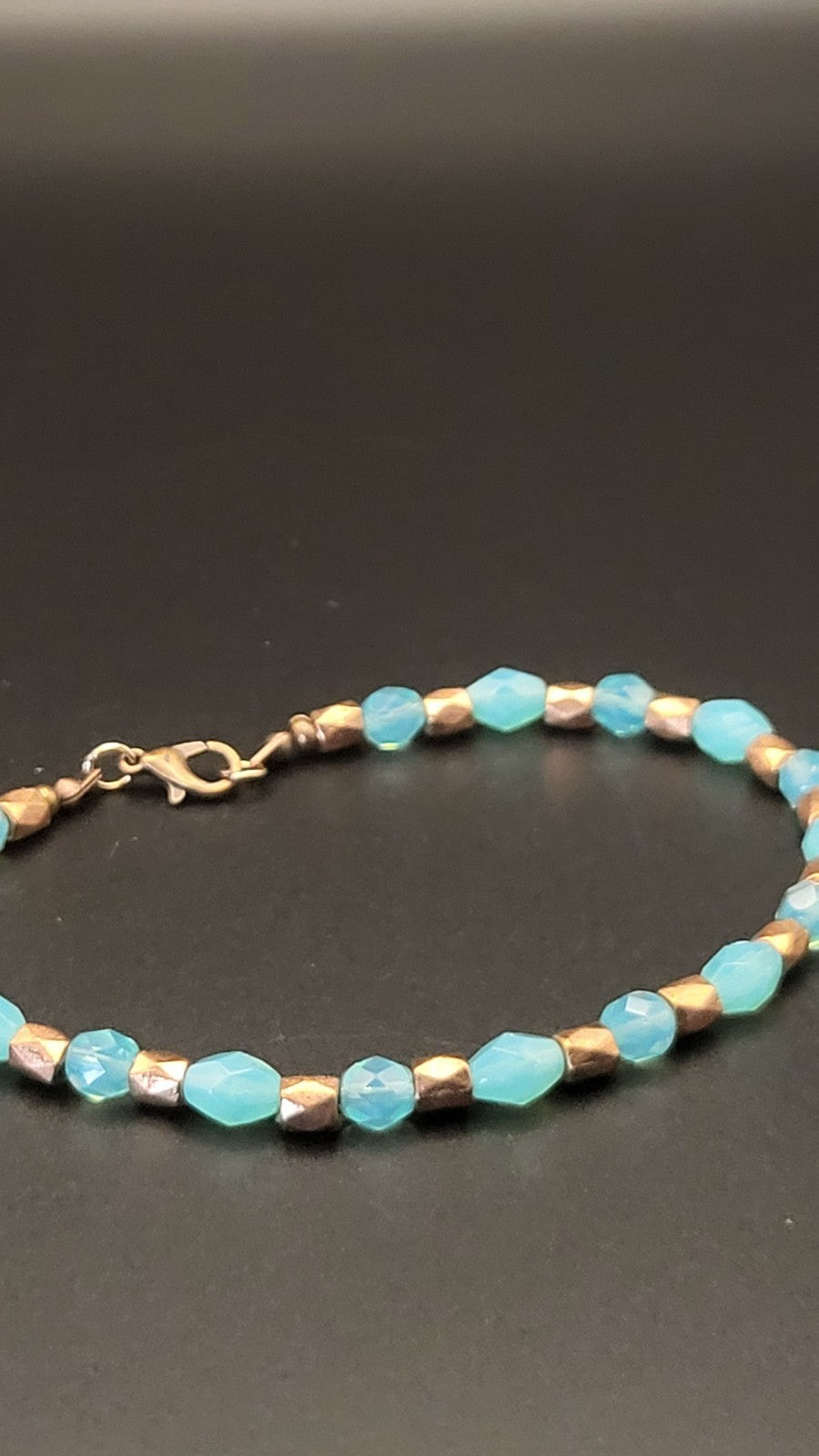 UV Glow Uranium Aqua Glass Beads and Copper Spacers 9"Stretch Bracelet