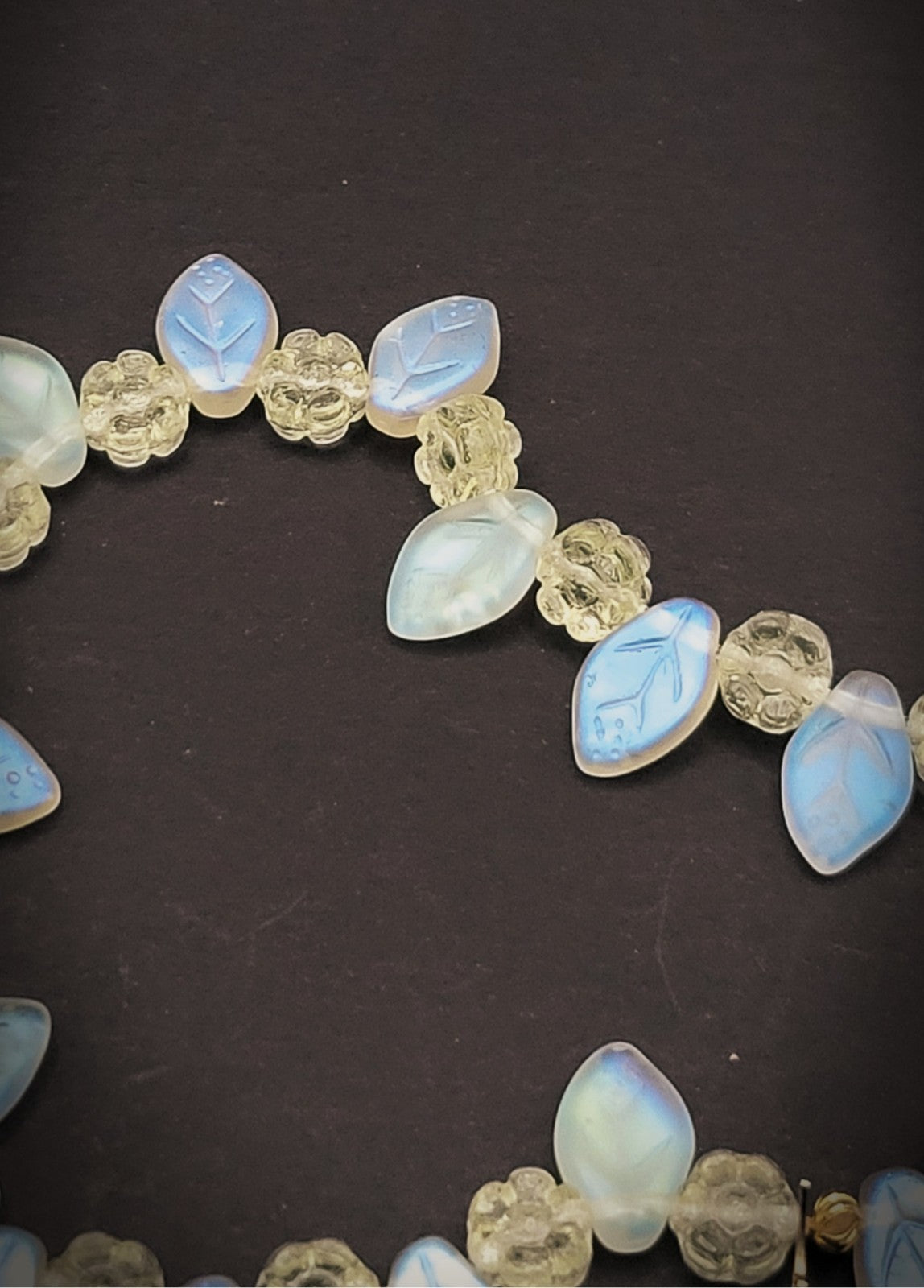 Uranium UV Glow Yellow Flowers with Iridescent Leaves, Starfish Charm Stretch 8" Bracelet