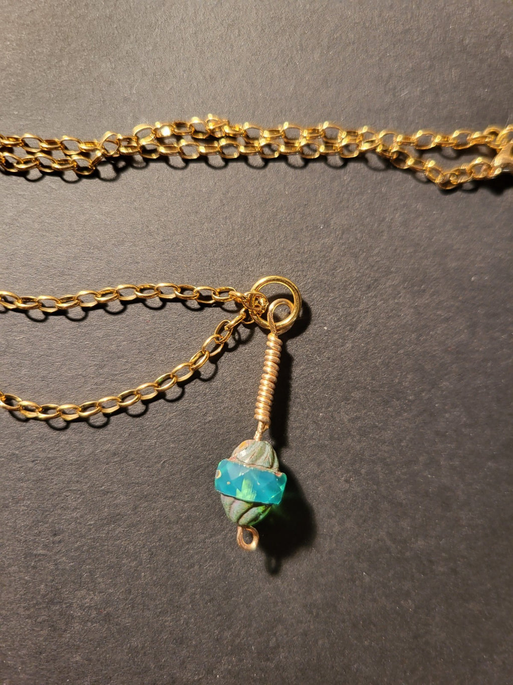 Uranium UV Glow Hand wired pendant, Aqua Czech glass bead pendant on an 18" Gold Tone Oval Link Chain