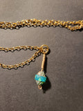 Uranium UV Glow Hand wired pendant, Aqua Czech glass bead pendant on an 18" Gold Tone Oval Link Chain