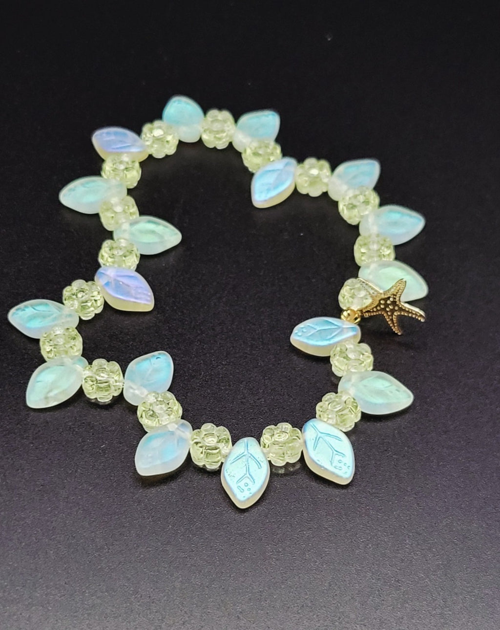 Uranium UV Glow Yellow Flowers with Iridescent Leaves, Starfish Charm Stretch 8" Bracelet