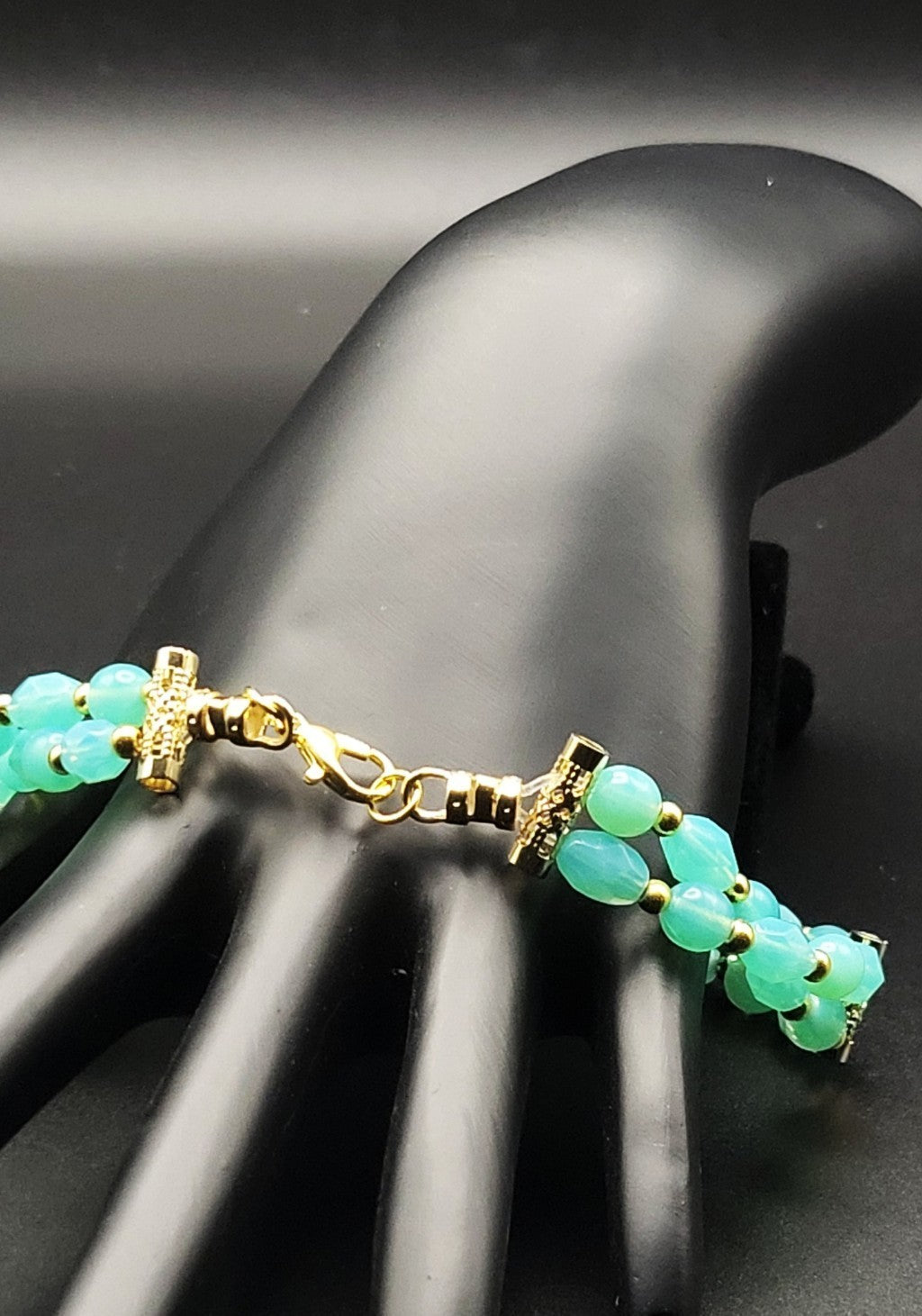 Uranium Glass UV Glow Aqua bead & Gold Accents 9" Stretch bracelet with Clasp